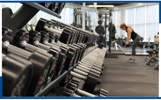 Spotless and inviting gym space, illustrating the impact of top-tier janitorial solutions for fitness centers.