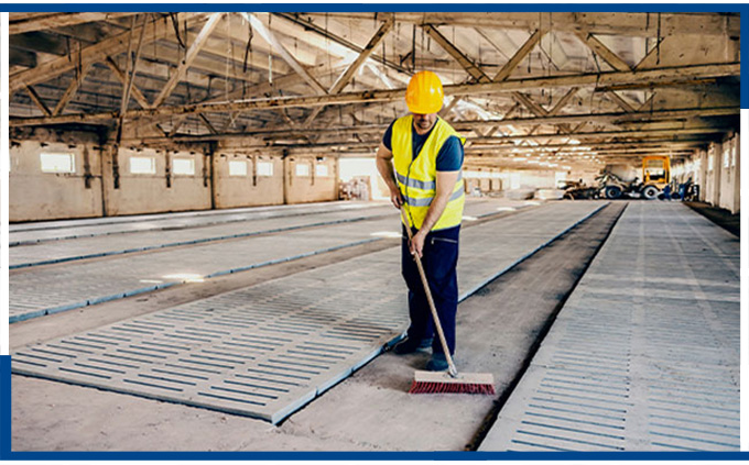 B&J Cleaning's professionals in industrial settings delivering janitorial solutions for a clean and organized work environment.