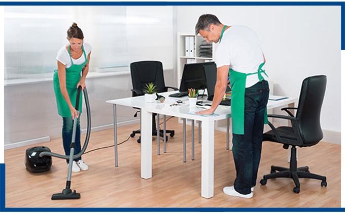 Professional janitors performing meticulous office cleaning services, ensuring a spotless and welcoming workspace.